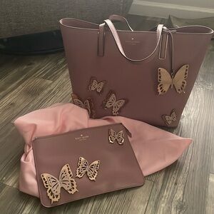 Kate Spade mauve purse. And small clutch purse